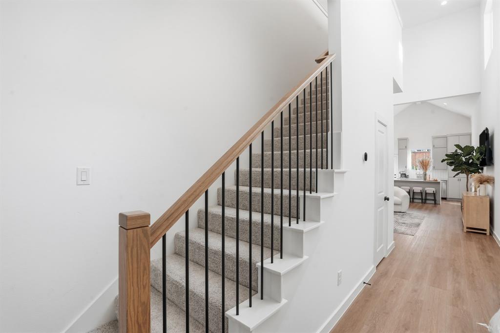 1301 Tillery Court Grapevine, TX 76051 - Photo 16 of 28 a view of entryway and hall with wooden floor