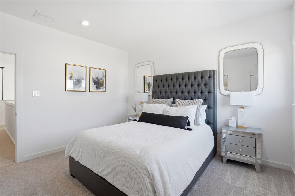 1301 Tillery Court Grapevine, TX 76051 - Photo 20 of 28 a bedroom with a bed and lamp