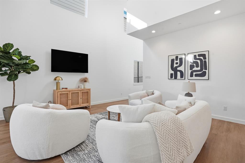 1301 Tillery Court Grapevine, TX 76051 - Photo 6 of 28 a living room with furniture and a flat screen tv