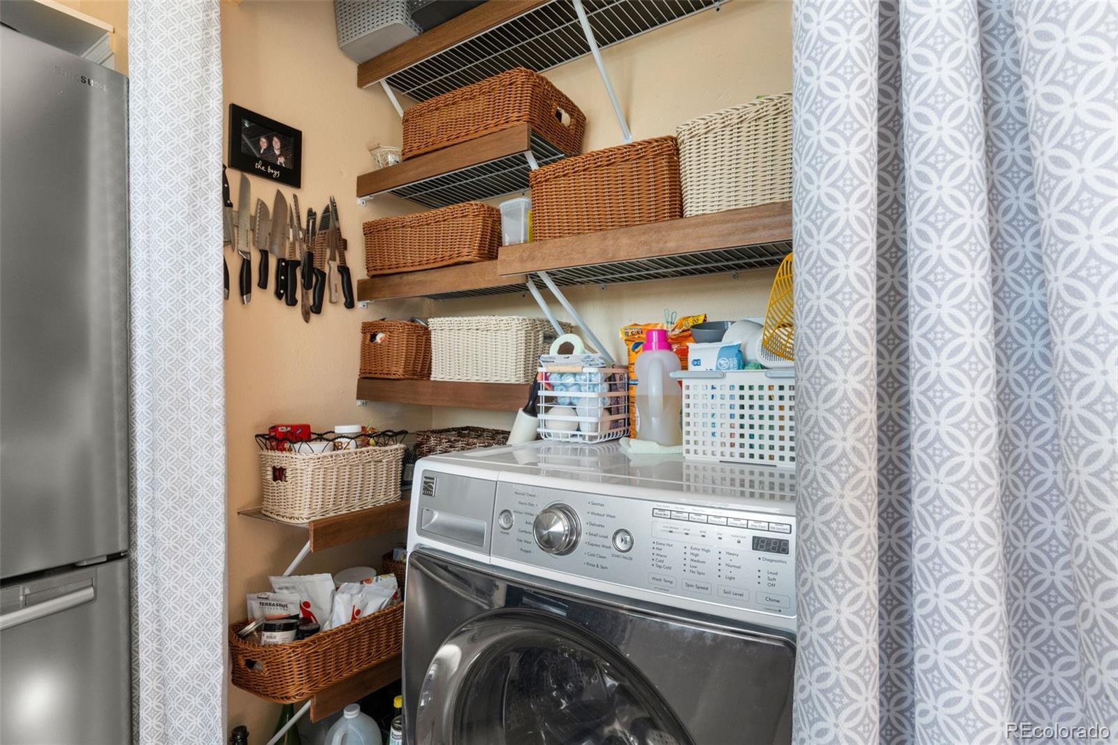 17467 East Rice Circle, Unit C Aurora, CO 80015 - Photo 12 of 25 a utility room with dryer and washer