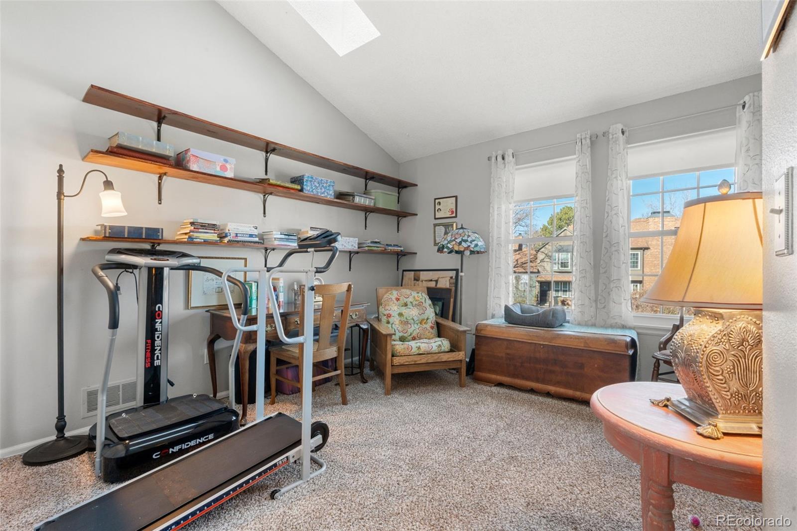 17467 East Rice Circle, Unit C Aurora, CO 80015 - Photo 13 of 25 a view of a room with gym equipment