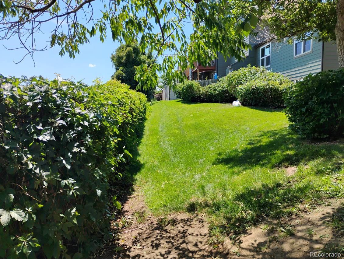 17467 East Rice Circle, Unit C Aurora, CO 80015 - Photo 20 of 25 a view of a garden