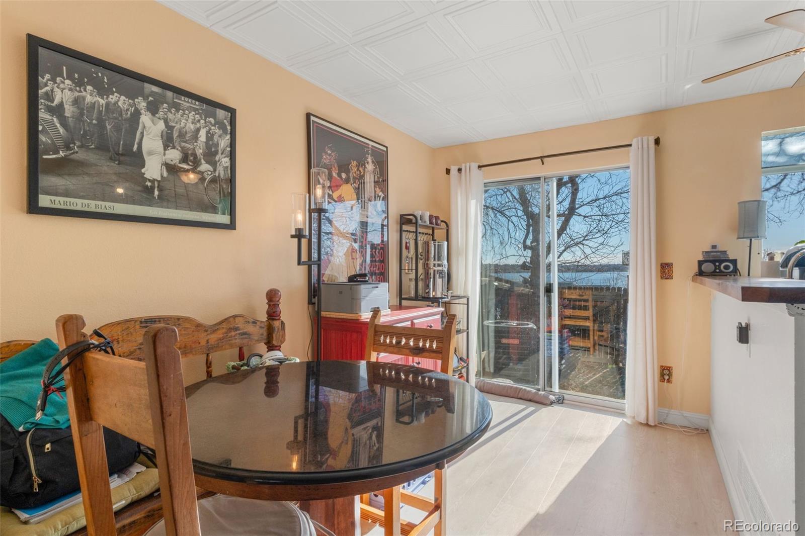 17467 East Rice Circle, Unit C Aurora, CO 80015 - Photo 10 of 25 a workspace with furniture and window