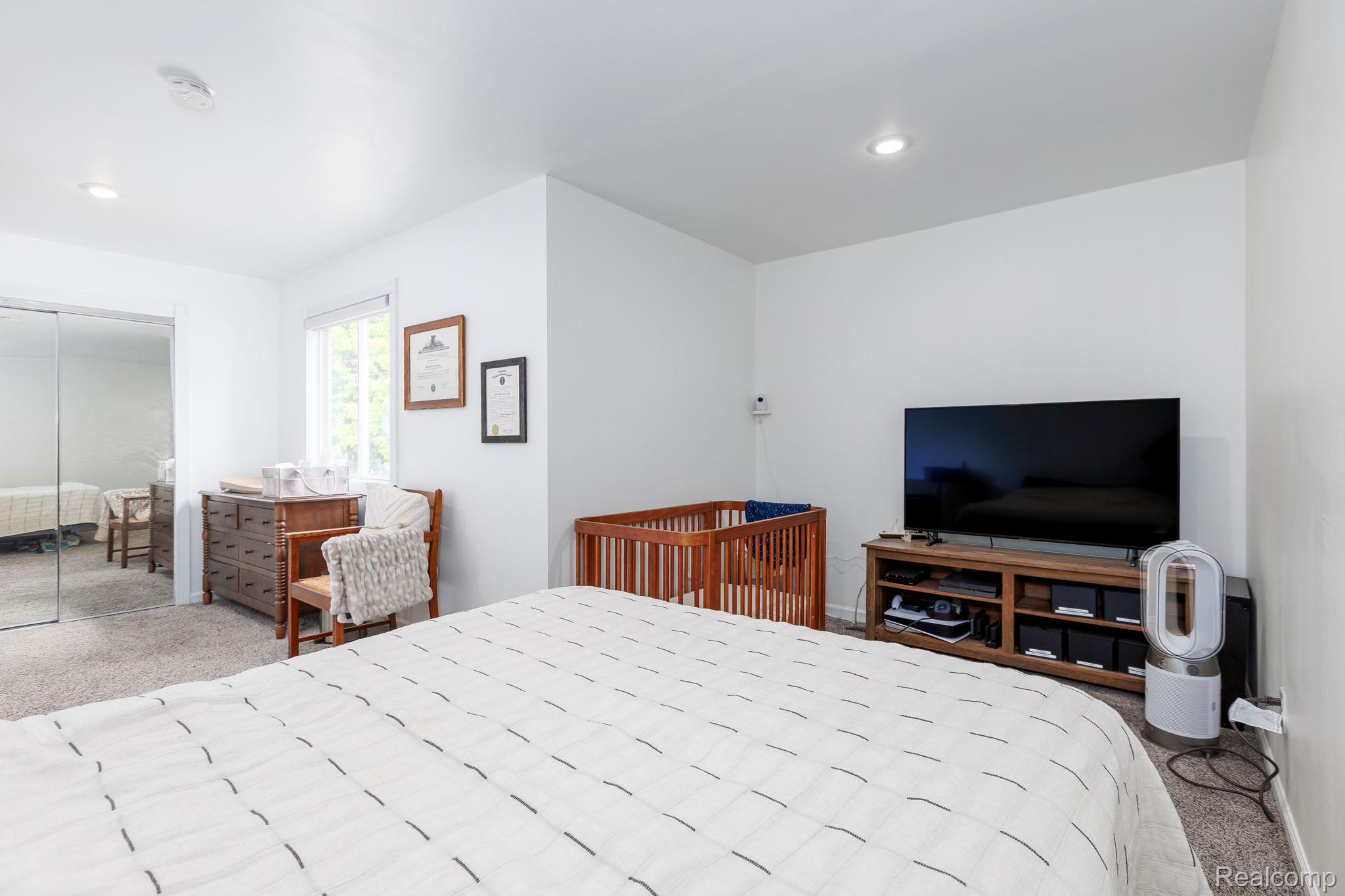 401 Pointe Tremble Road Algonac, MI 48001 - Photo 37 of 40 Carpeted room with recessed lighting and white walls