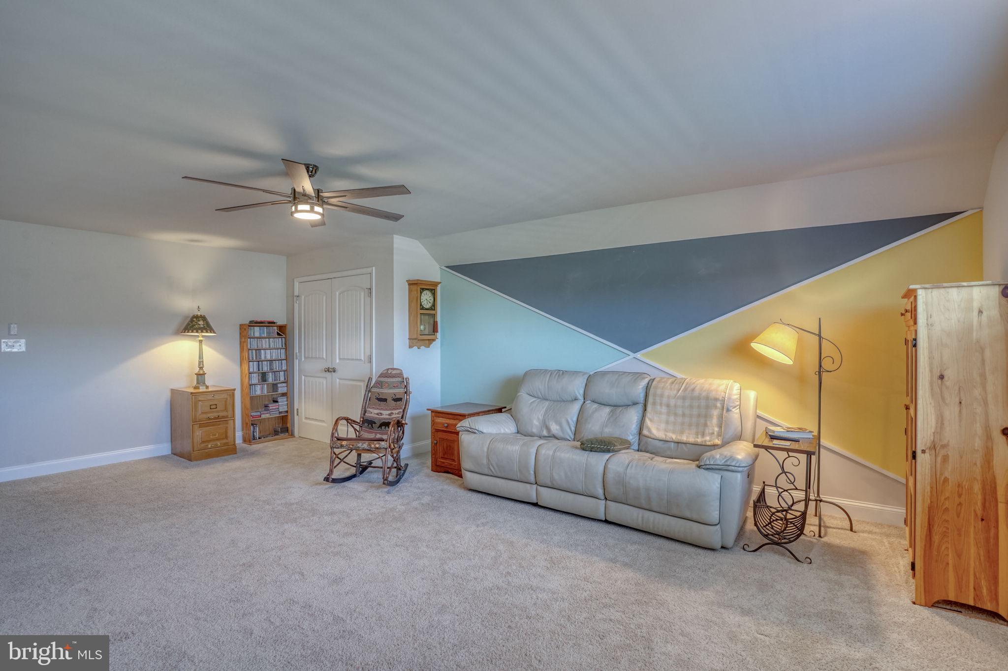 15272 Crape Myrtle Road Milton, DE 19968 - Photo 58 of 61 Spacious room with modern accents.