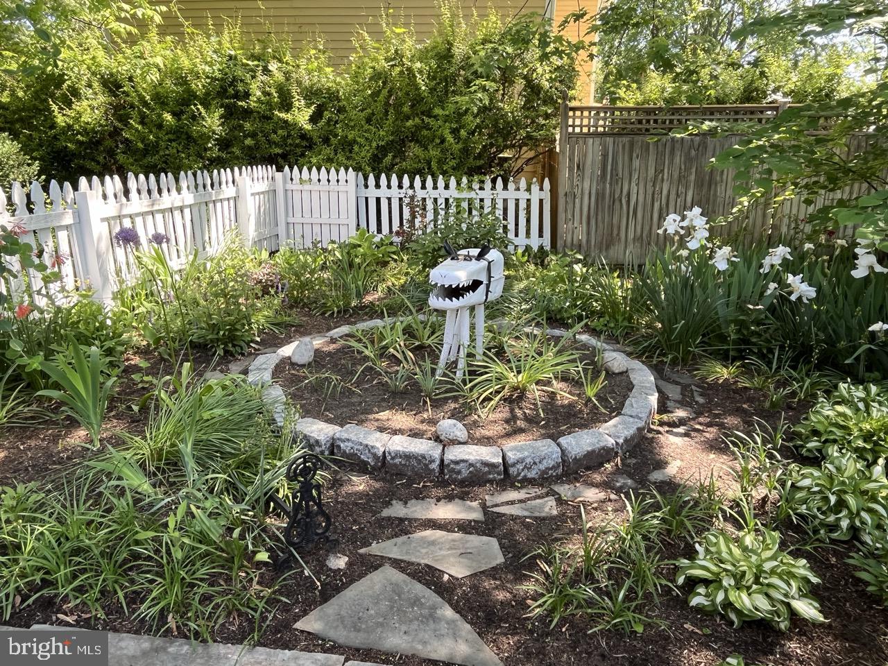 106 East Chestnut Street St. Michaels, MD 21663 - Photo 37 of 39 a garden view with a fountain