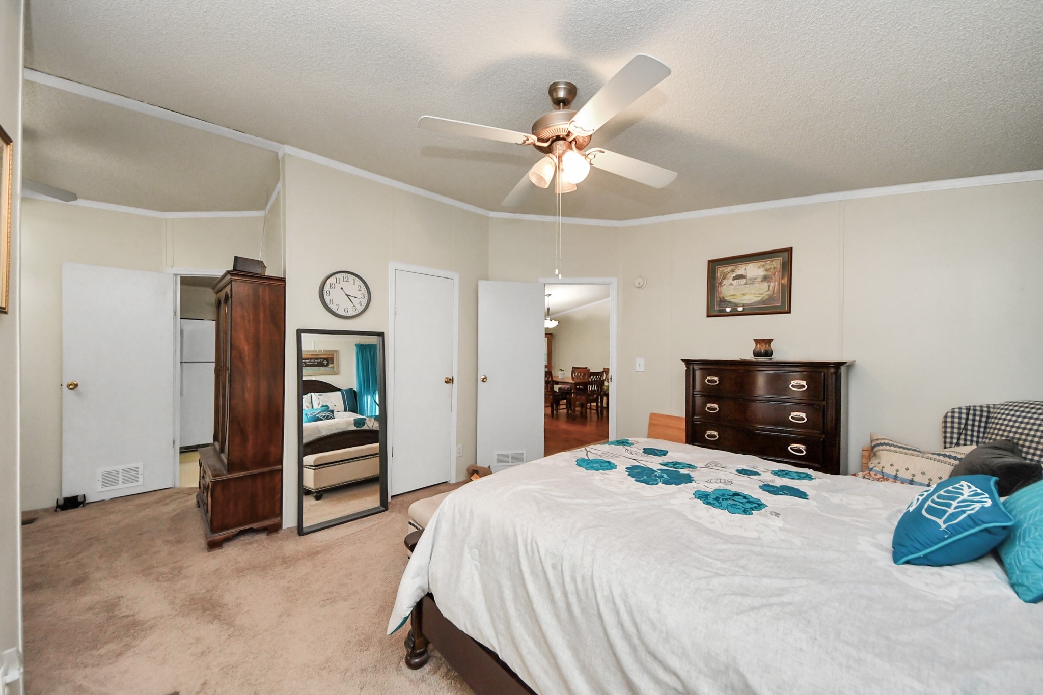 204 Edith Street Highlands, TX 77562 - Photo 9 of 33 a bedroom with a bed and a tv