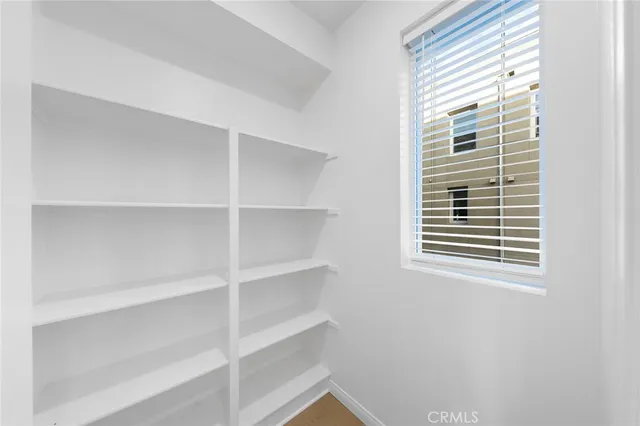 a view of a room that has a window in it