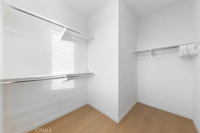 a view of an empty walk in closet
