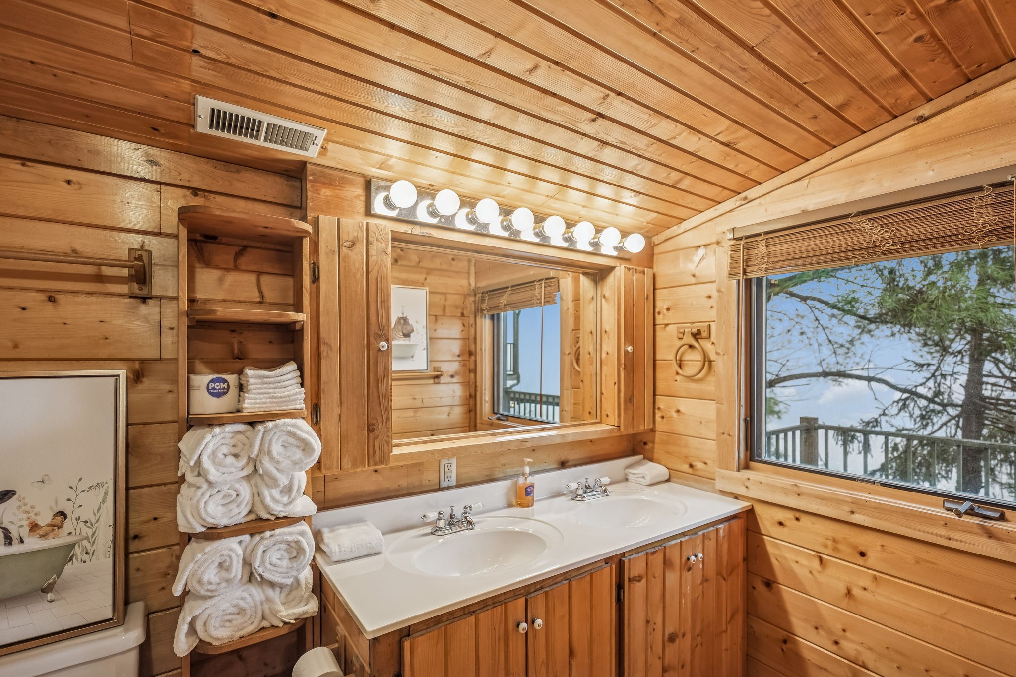 289 Dunn Ridge Road Baxter, TN 38544 - Photo 28 of 42 a bathroom with a sink and a mirror