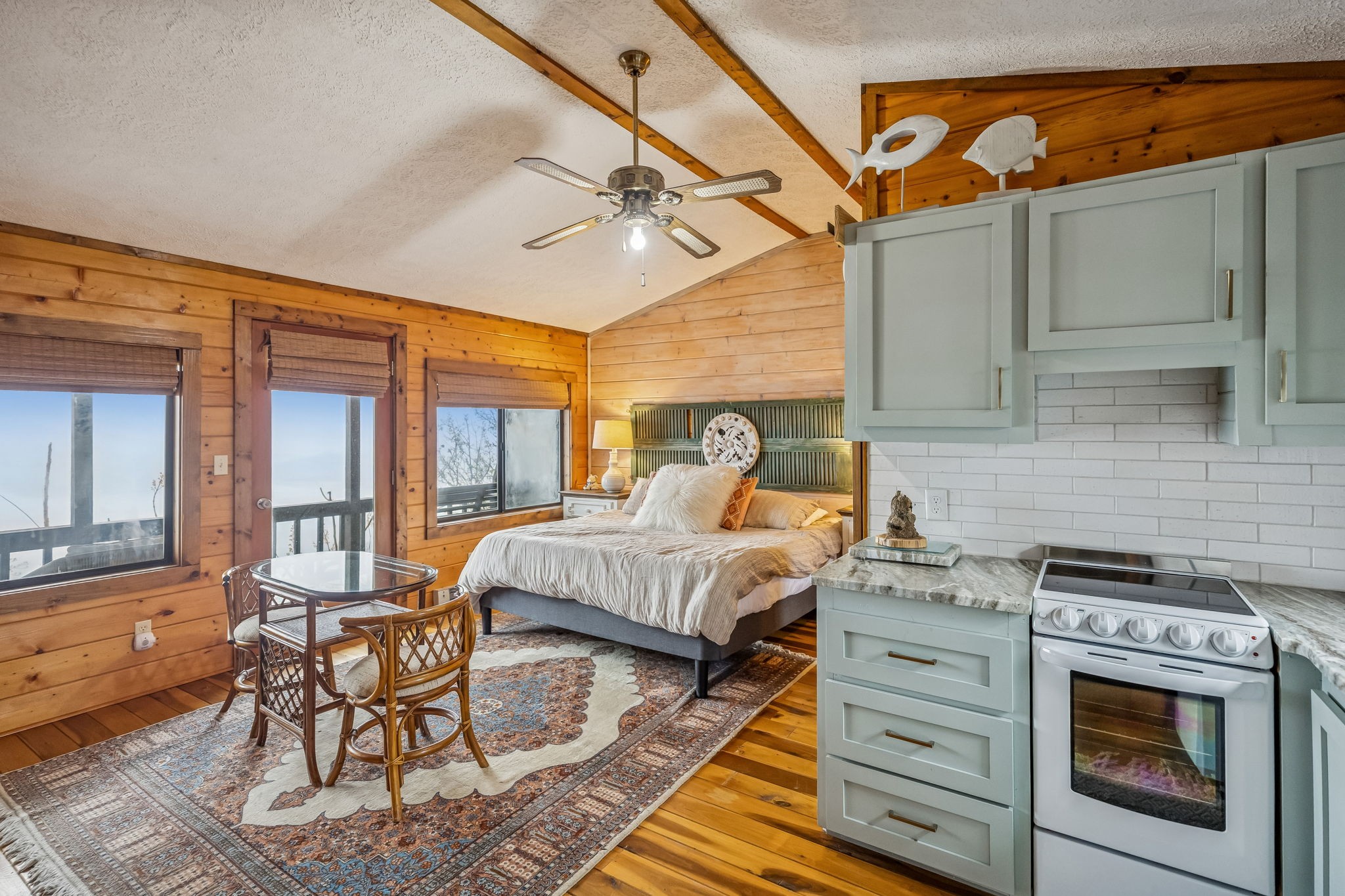 289 Dunn Ridge Road Baxter, TN 38544 - Photo 30 of 42 a bed room with a bed and a chair