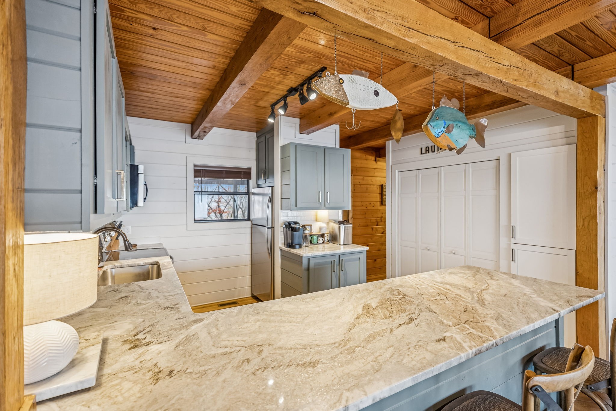 289 Dunn Ridge Road Baxter, TN 38544 - Photo 5 of 42 a kitchen with stainless steel appliances granite countertop a sink and cabinets