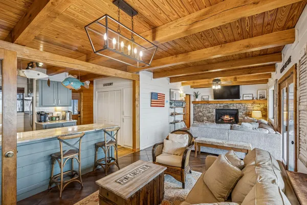 a living room with furniture and a table