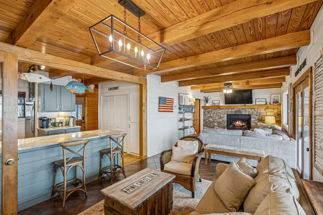 a living room with furniture and a table