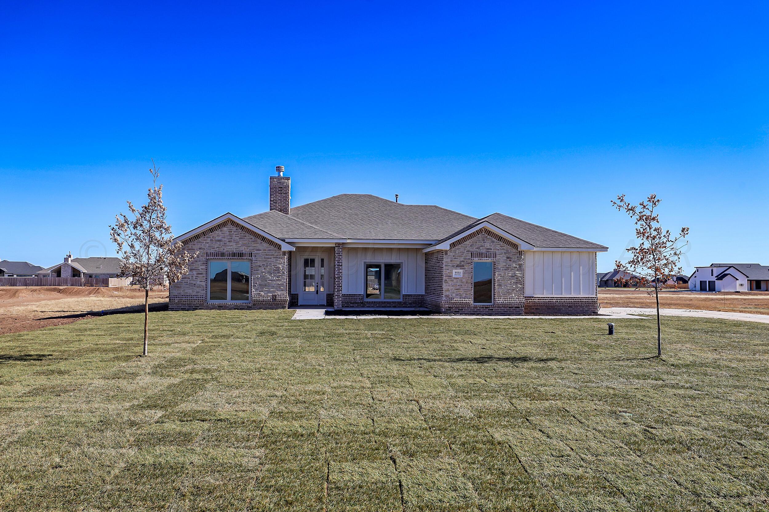 a house view with a garden space