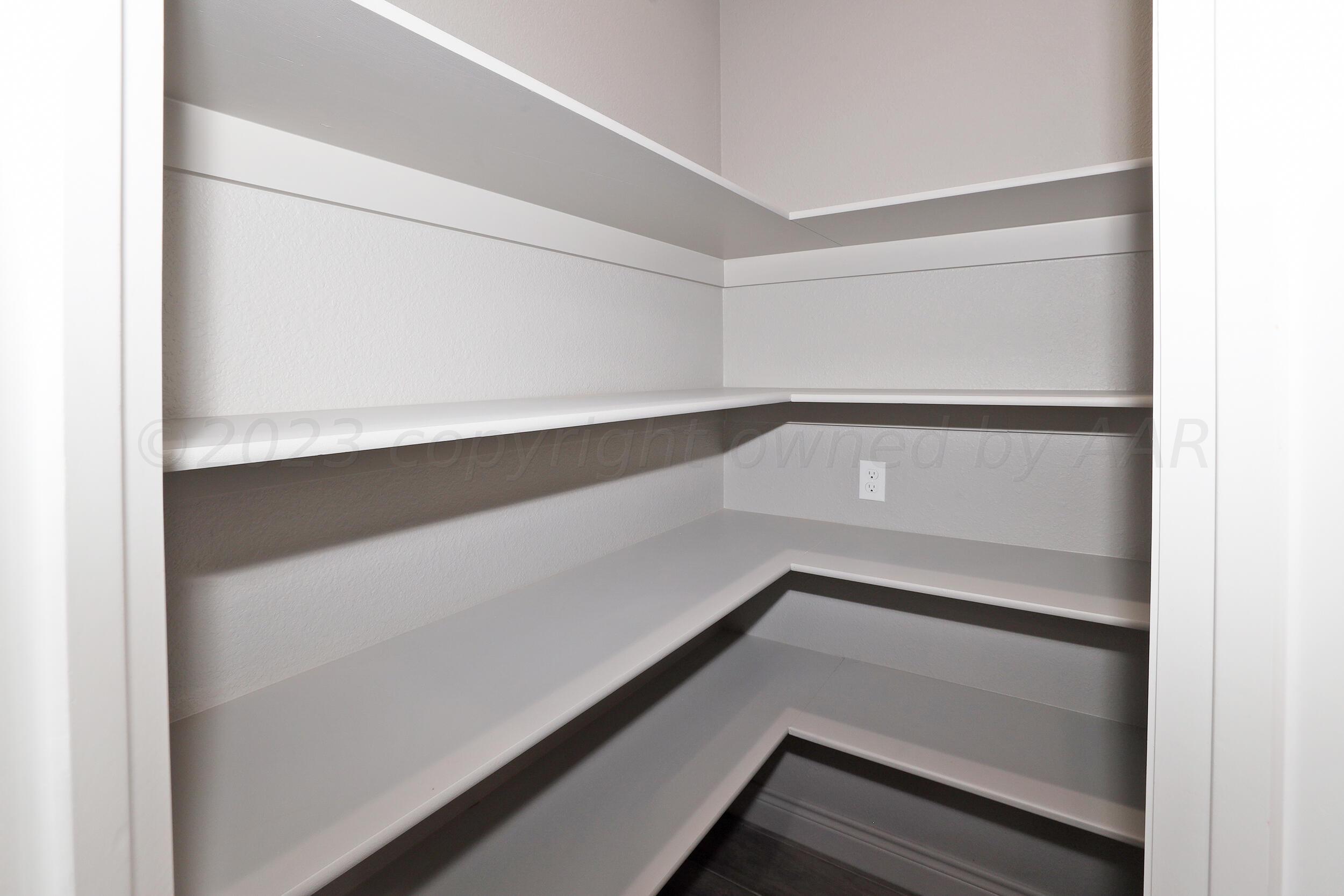 9551 Trinity Drive Amarillo, TX 79119 - Photo 36 of 46 a view of an empty walk in closet