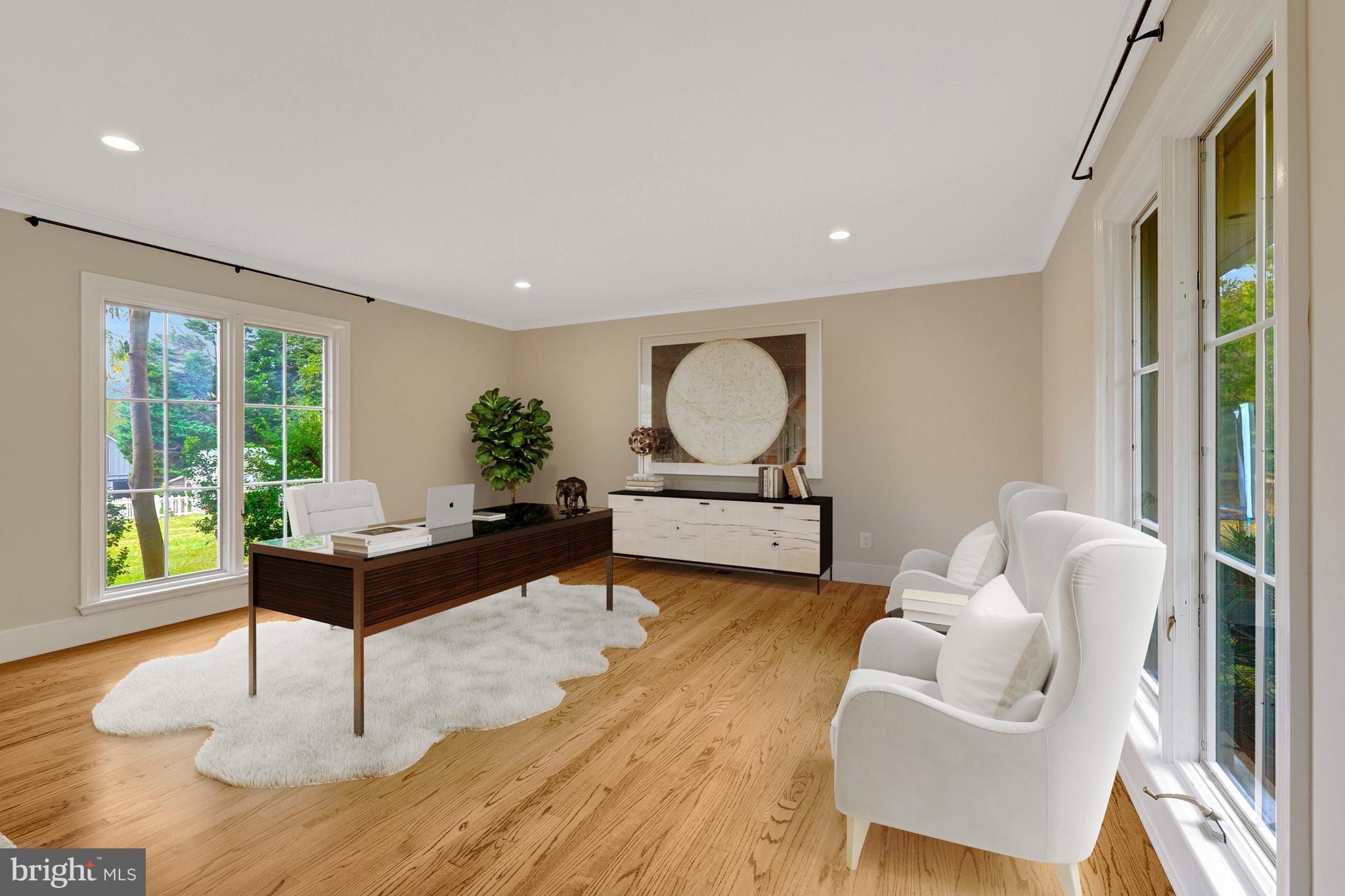 440 Montpelier Road Great Falls, VA 22066 - Photo 32 of 79 a living room with furniture and a large window