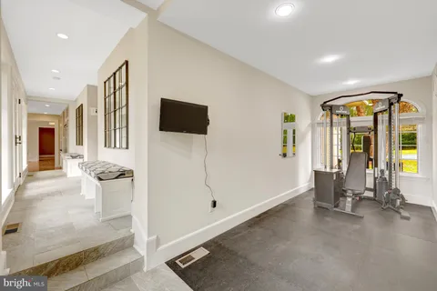 a bathroom with a bathtub and shower