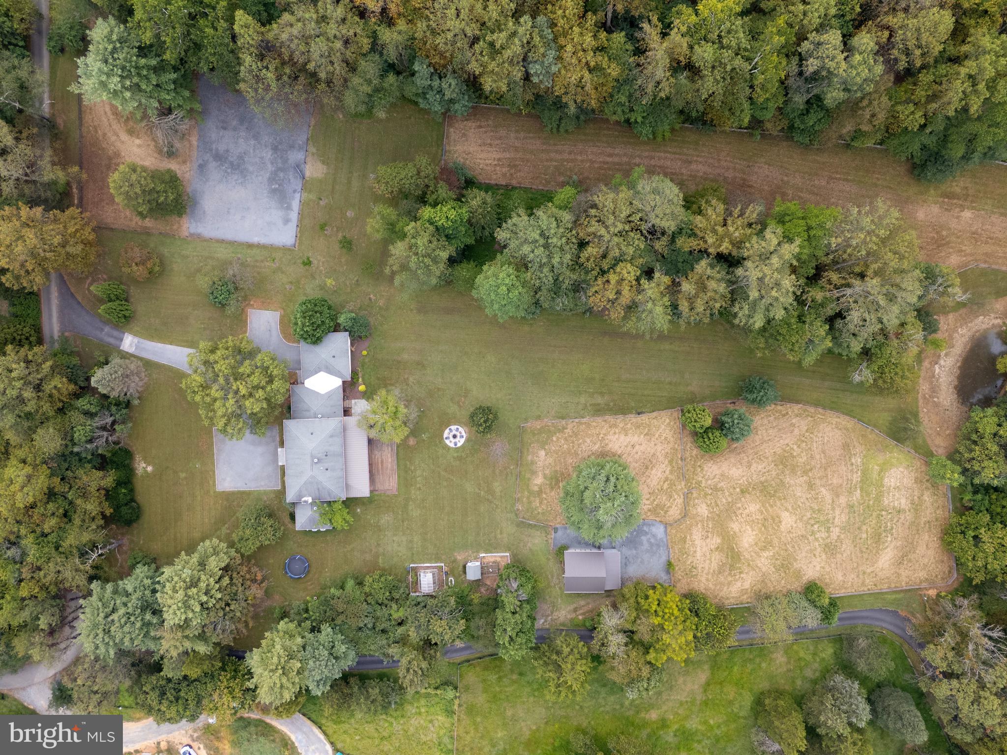 440 Montpelier Road Great Falls, VA 22066 - Photo 4 of 79 an aerial view of a house with a yard and lake view