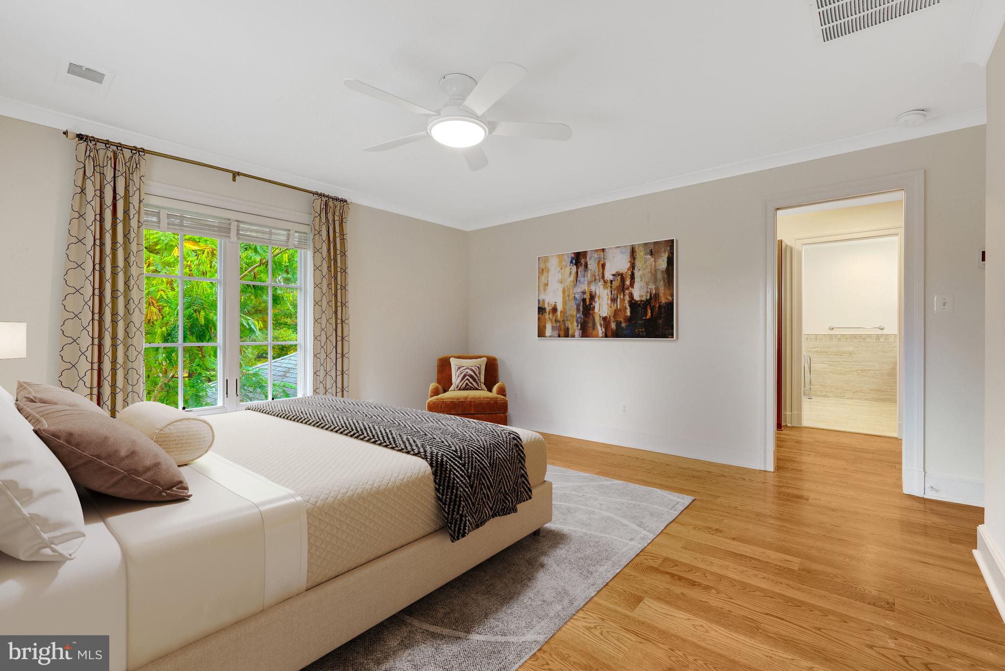 440 Montpelier Road Great Falls, VA 22066 - Photo 44 of 79 a bedroom with a bed and a large window