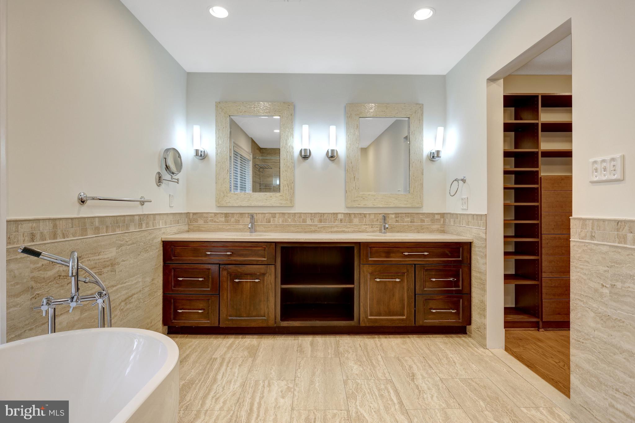 440 Montpelier Road Great Falls, VA 22066 - Photo 48 of 79 a spacious bathroom with a granite countertop sink mirror and