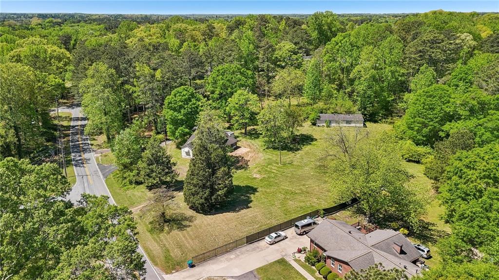 5735 Old Bill Cook Road Atlanta, GA 30349 - Photo 21 of 38 a view of a yard with an outdoor space