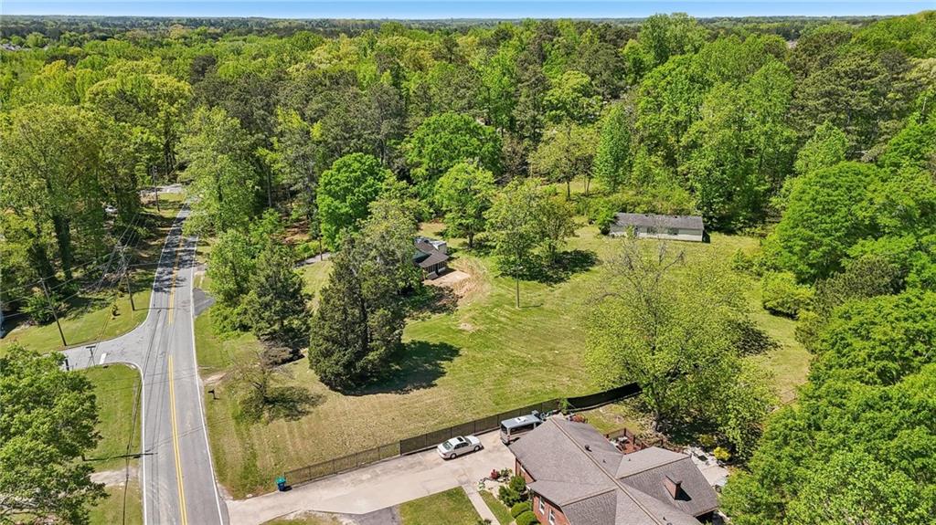 5735 Old Bill Cook Road Atlanta, GA 30349 - Photo 22 of 38 an aerial view of residential house with an outdoor space