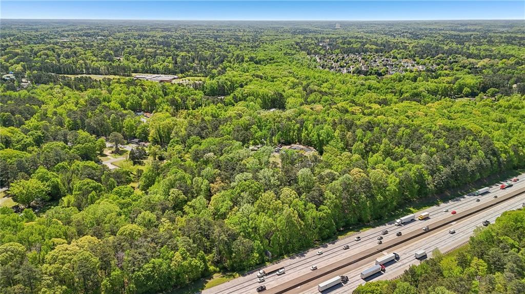 5735 Old Bill Cook Road Atlanta, GA 30349 - Photo 27 of 38 a view of a city from a balcony
