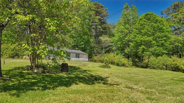 a backyard of a house with seating space