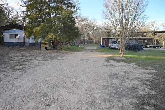 a view of road with trees