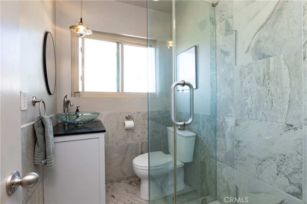 733 Crane Boulevard Los Angeles, CA 90065 - Photo 18 of 30 a bathroom with a toilet sink and shower