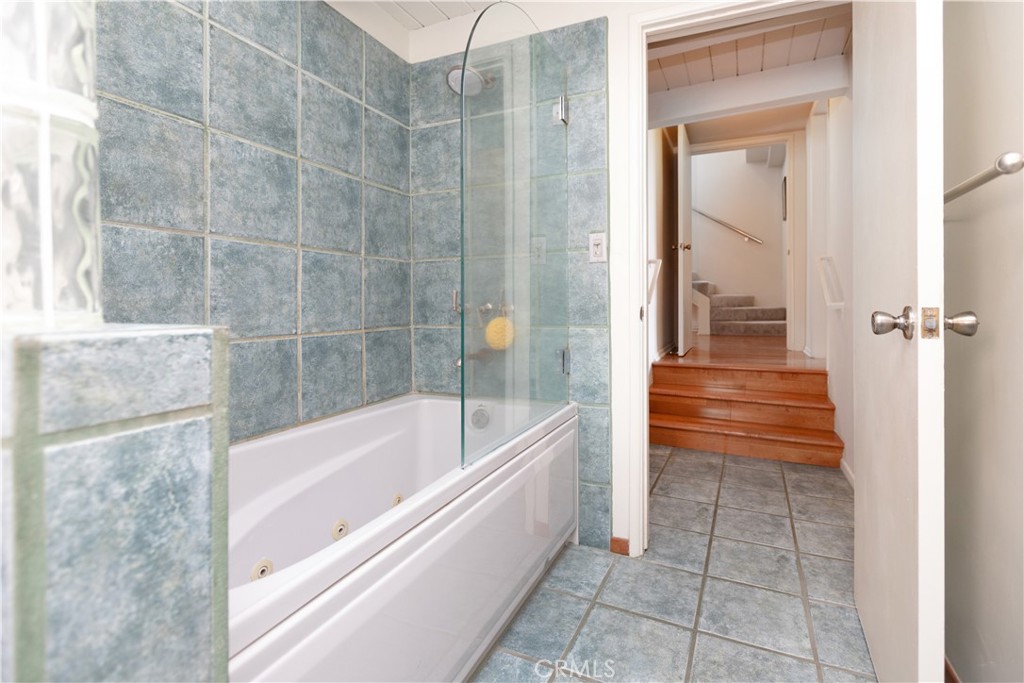 733 Crane Boulevard Los Angeles, CA 90065 - Photo 26 of 30 a bathroom with a bathtub and a shower