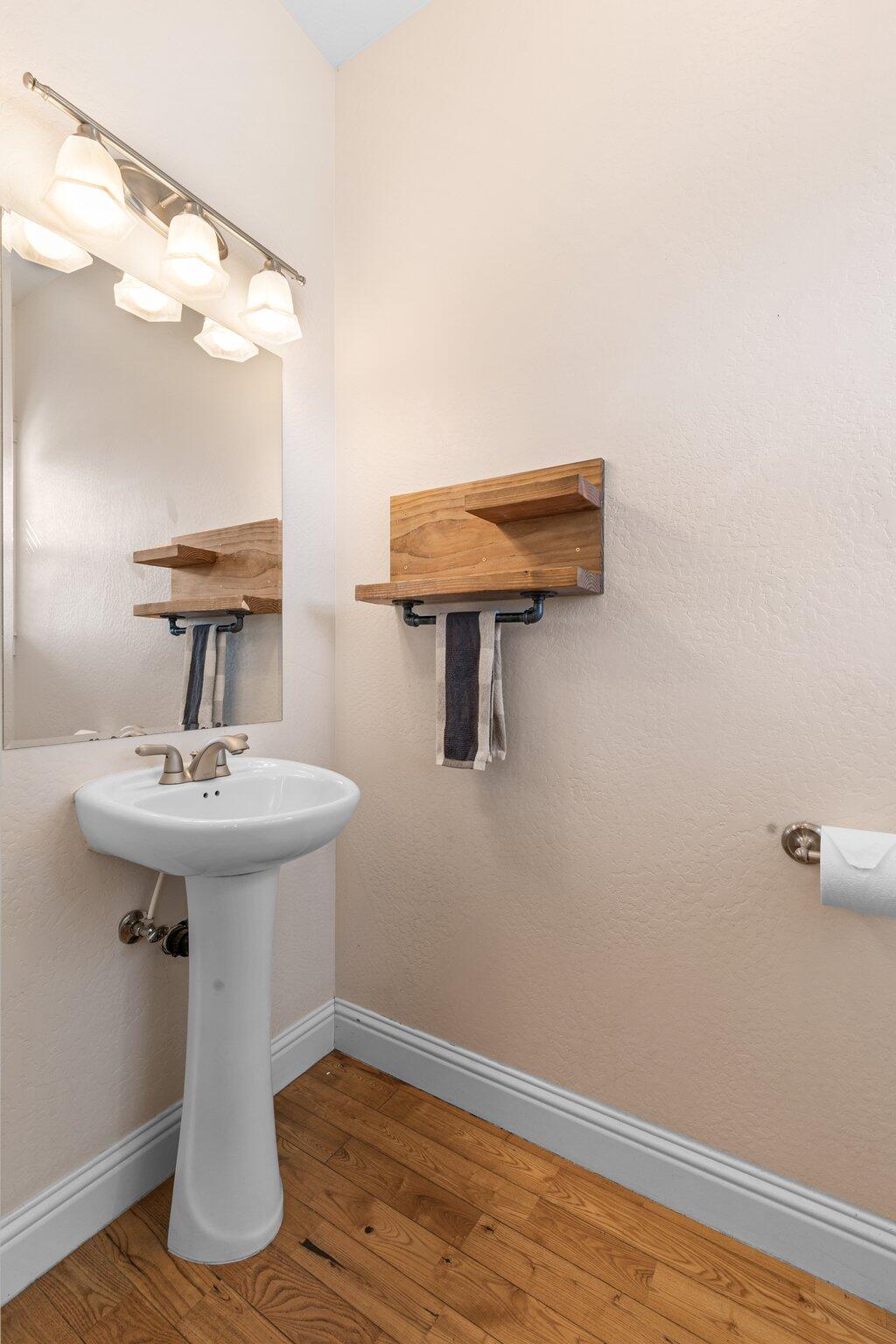 1965 Rabun Way Central Point, OR 97502 - Photo 24 of 47 a bathroom with a sink a mirror and vanity
