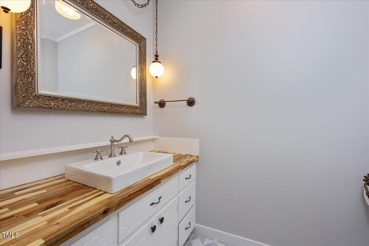 1933 Fletchers Chapel Road Durham, NC 27703 - Photo 19 of 61 half bathroom
