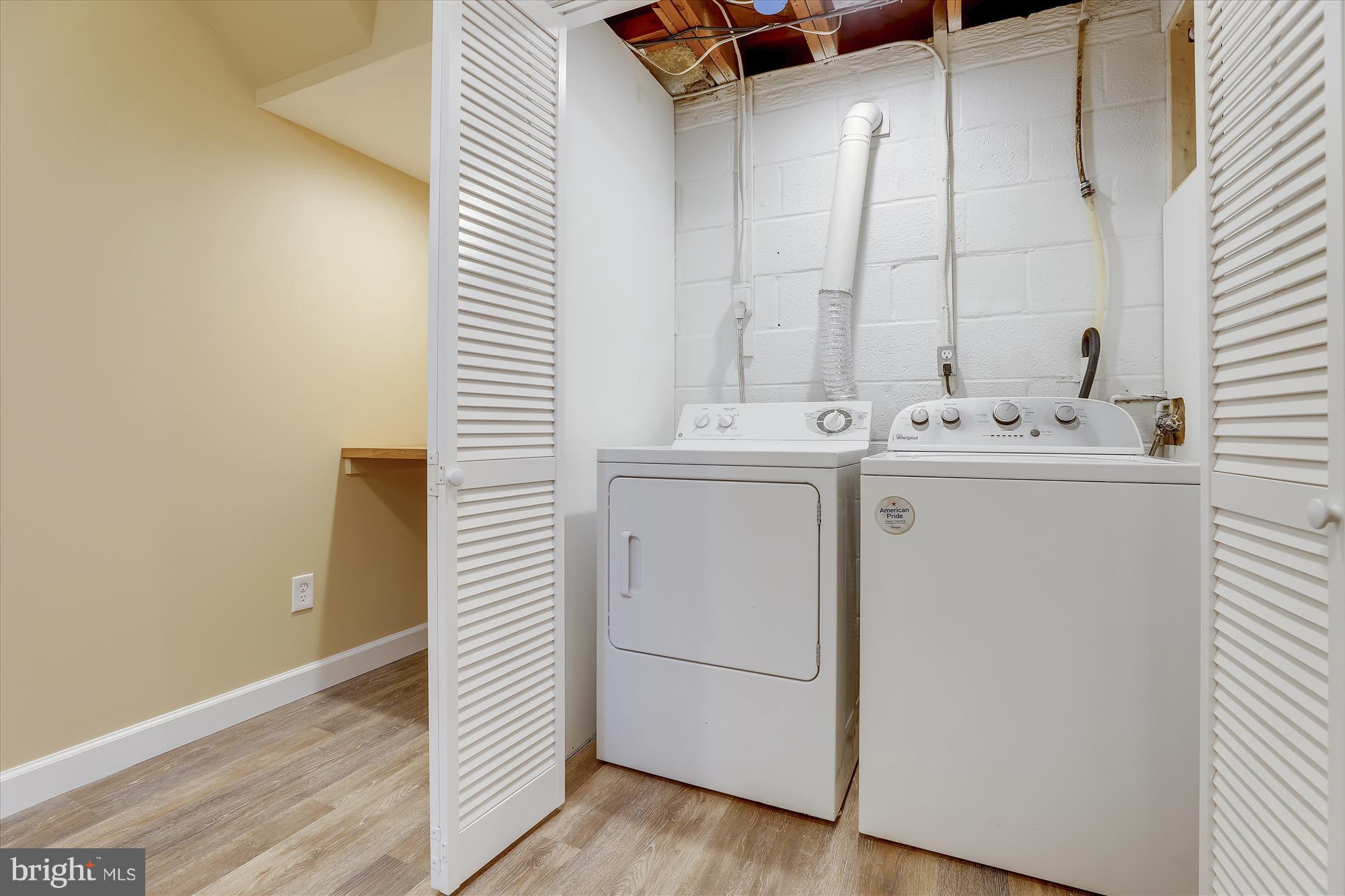 10779 Kinloch Road Silver Spring, MD 20903 - Photo 23 of 28 Laundry with folding area