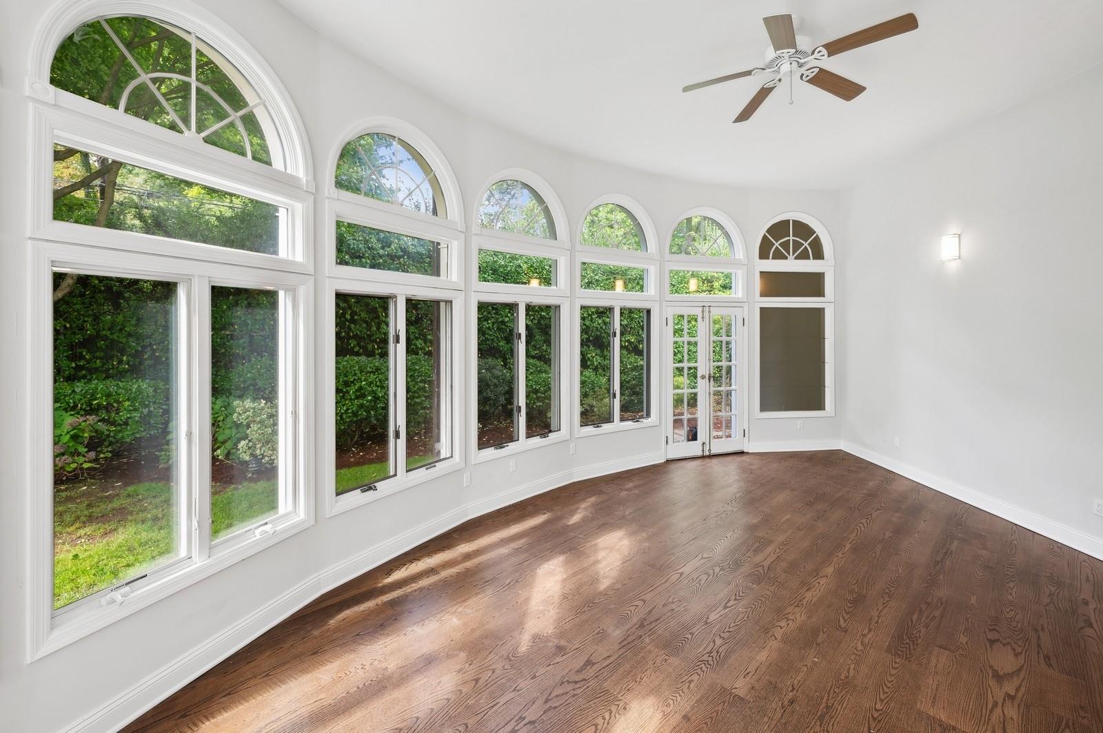 45 Durham Road Bronxville, NY 10708 - Photo 19 of 25 Unfurnished sunroom featuring ceiling fan