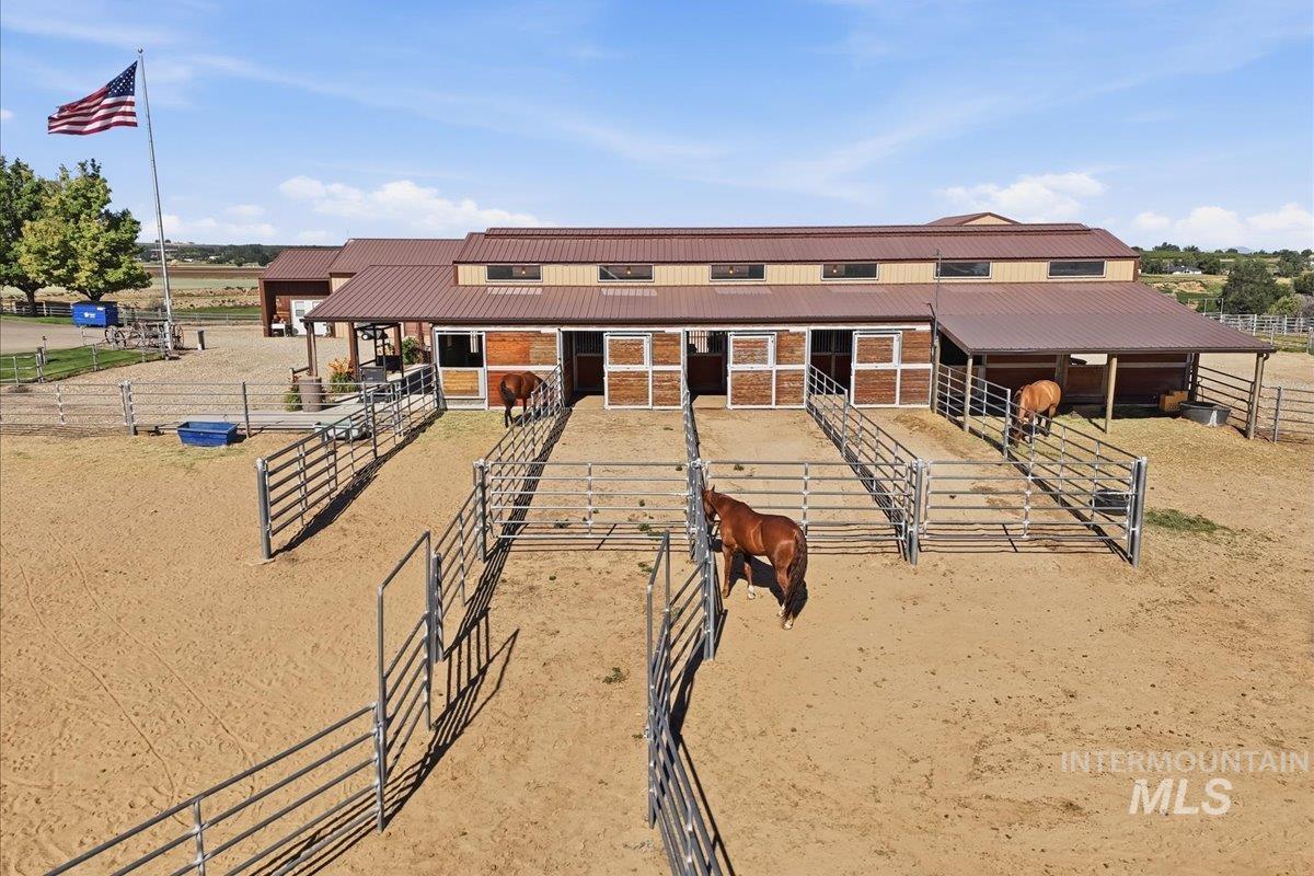 20337 Maggard Lane Caldwell, ID 83607 - Photo 34 of 50 Noble panels are adjustable and offer options for individual stall runs.