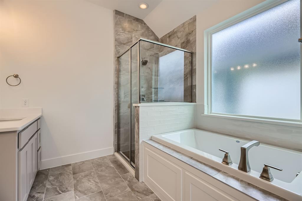 2620 Cedar Rdg Road Celina, TX 75009 - Photo 15 of 27 Full bathroom featuring a bath, a stall shower, and vanity
