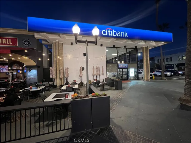 a view of a street with cars on the road