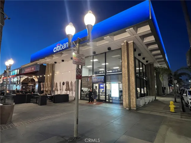 a view of a street with a building in the background