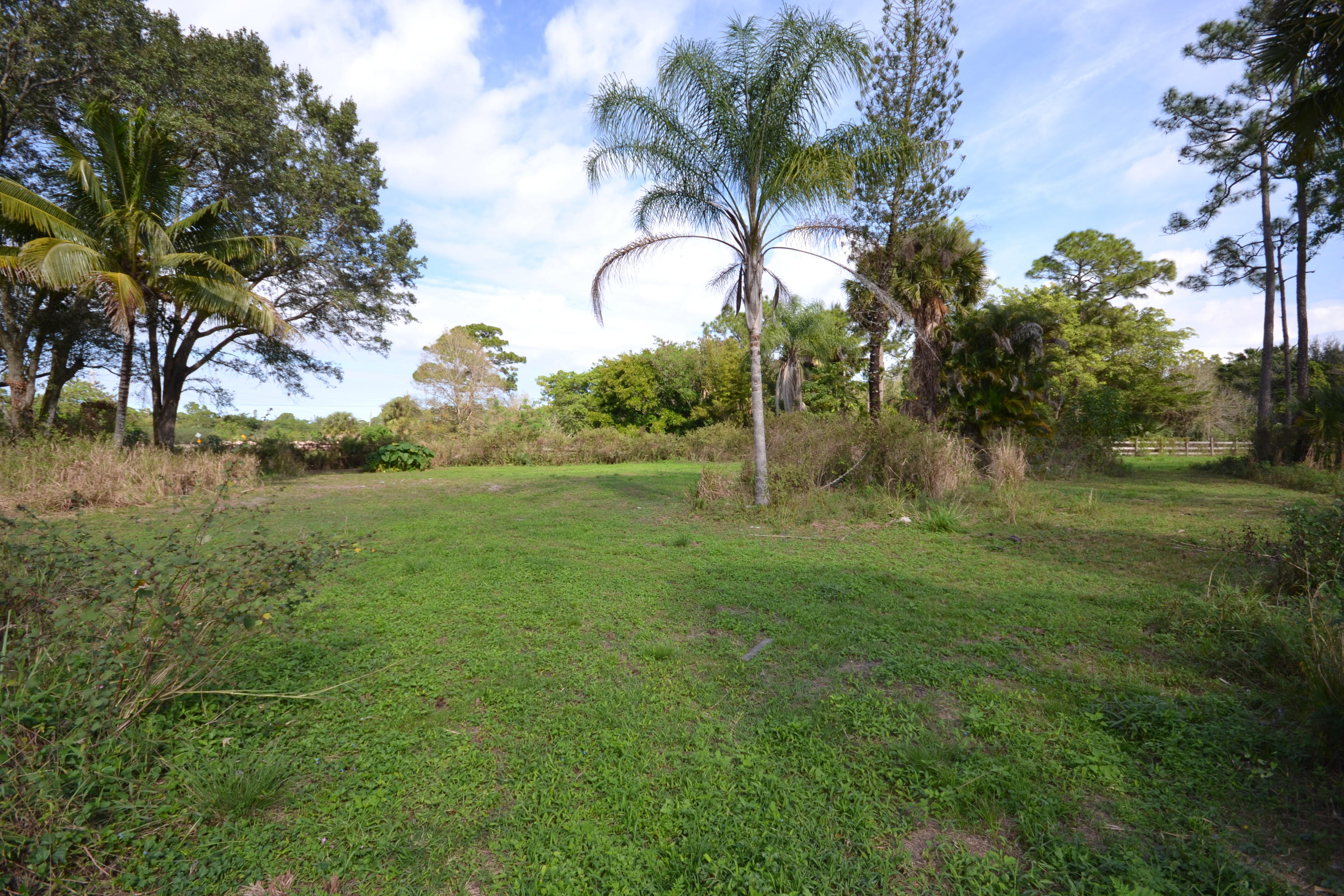 3320 C Road Loxahatchee, FL 33470 - Photo 13 of 15 a view of outdoor space with deck and yard