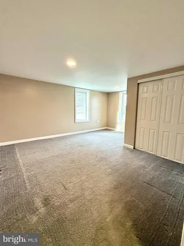 an empty room with a natural light