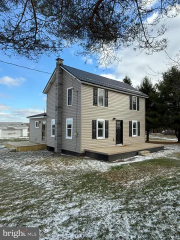 a house view with a garden space