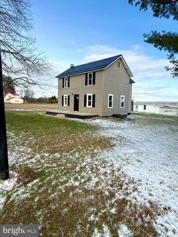 a house view with garden space