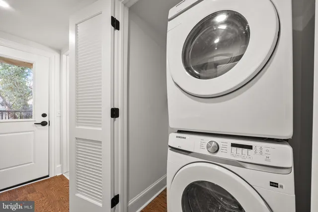 a close up view of a washer and dryer in a utility room