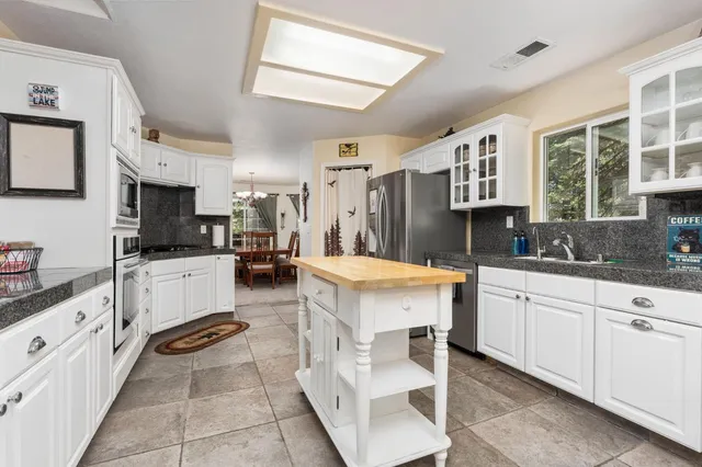 a kitchen with a sink cabinets and counter space