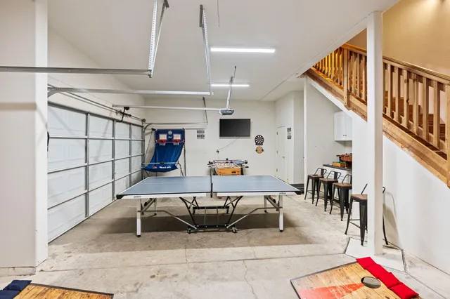 a living room with lots of furniture and appliances