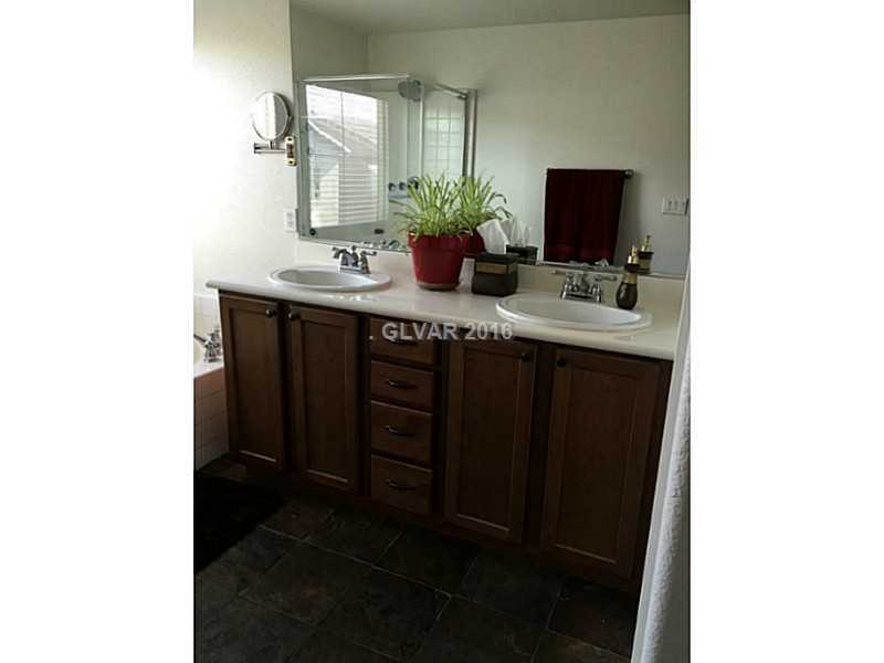 10554 Cave Ridge Street Las Vegas, NV 89179 - Photo 15 of 19 Master Bath/Spa. Double sinks in master bath, separate tub shower