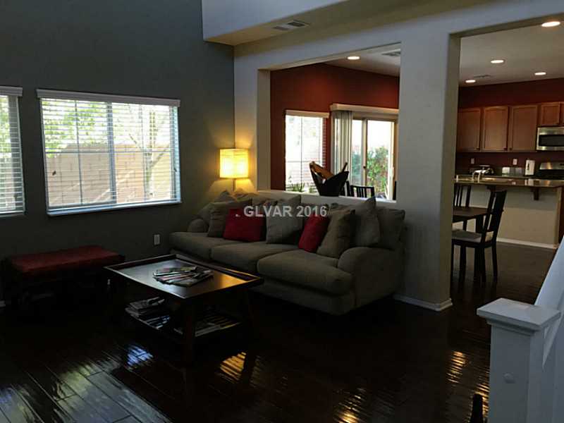 10554 Cave Ridge Street Las Vegas, NV 89179 - Photo 8 of 19 Great Room. Stunning hardwood flooring