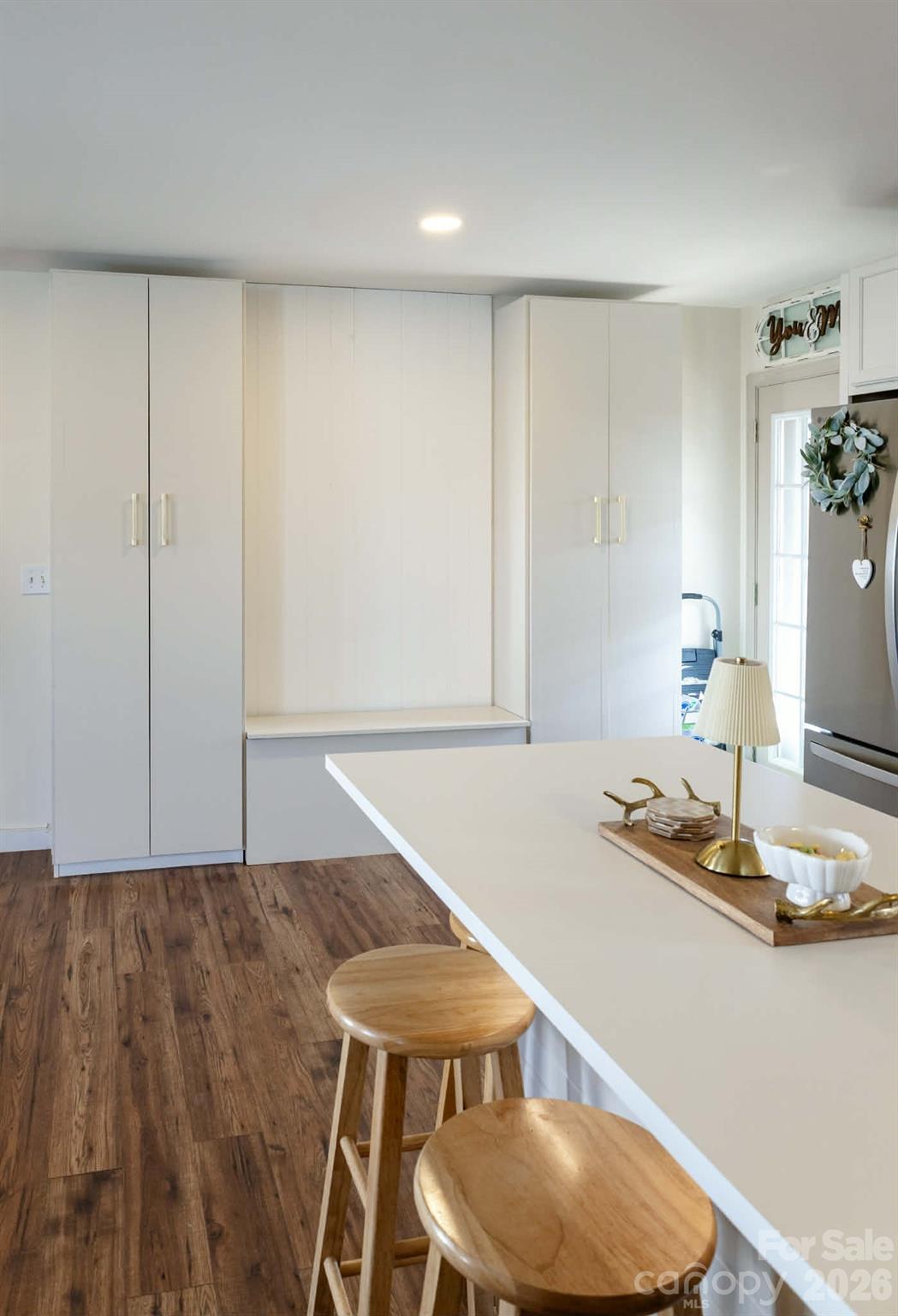 202 East Rice Street Landis, NC 28088 - Photo 11 of 23 a kitchen with a table and chairs in it